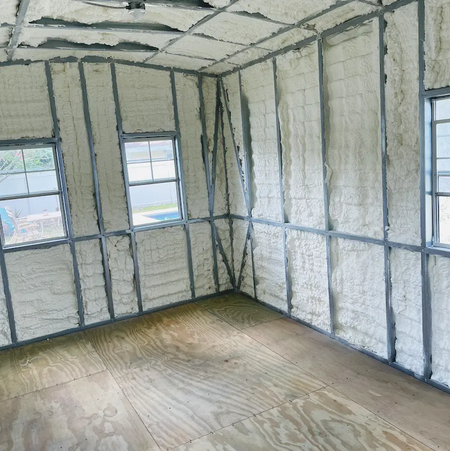 Closed-cell spray foam insulation applied to wall cavities in a residential project in Palm River-Clair Mel